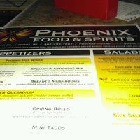 Photo taken at Phoenix Food &amp;amp; Spirits by Danielle L. on 8/1/2012