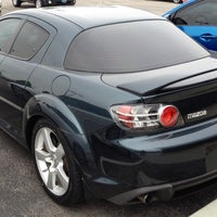 Photo taken at Woodhouse Mazda by Ted K. on 4/28/2012