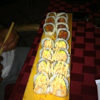 Photo taken at Yoshis Sushi &amp;amp; Grill by Jessica C. on 9/2/2012