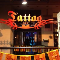 Photo taken at Tattoo Bar by Mike S. on 5/7/2012