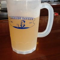Photo taken at Lakeside Tavern by Lauren B. on 7/31/2012