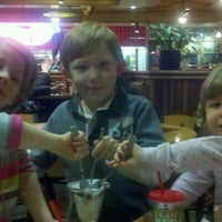 Photo taken at Red Robin Gourmet Burgers and Brews by Brook H. on 11/29/2011