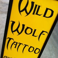 Photo taken at :: Wild Wolf Tattoo and Piercing Studio :: by Jybs Z. on 12/23/2011