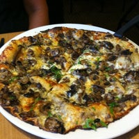 Photo taken at California Pizza Kitchen by Jennifer S. on 9/13/2011