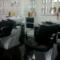 Photo taken at Sunsilk Hair Studio by Jai C. on 9/24/2011