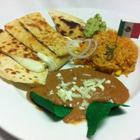 Photo taken at Ensenada Restaurant and Bar by Marisol R. on 12/16/2011