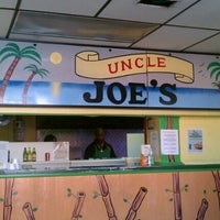 Photo taken at Uncle Joe&amp;#39;s Tropical Dining by James W. on 11/1/2011
