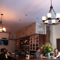 Photo taken at The Tangled Vine Wine Bar &amp;amp; Kitchen by Jenny S. on 8/23/2011