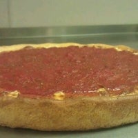 Foto diambil di Louie&amp;#39;s Pizza Company oleh Kevin pada 1/23/2012