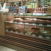 Photo taken at Leonidas Belgian Chocolates by Christine M. on 7/30/2011