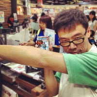 Photo taken at Popular Bookstore by Ng J. on 9/8/2012