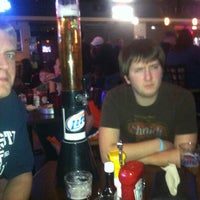 Photo taken at Scoreboards Pub &amp;amp; Grill by Andrew K. on 3/29/2012