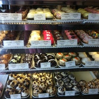 Photo taken at Crumbs Bake Shop by Tiffany H. L. on 4/5/2012
