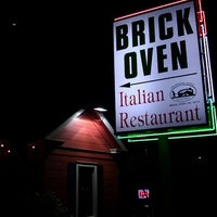 Photo taken at Brick Oven on 35th by Ricardo G. on 2/20/2012