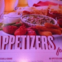 Photo taken at Applebee&amp;#39;s Neighborhood Grill &amp;amp; Bar by Tremaine G. on 2/23/2012
