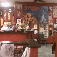 Photo taken at Ace of Hearts Tattoo by Elmo O. on 3/4/2012