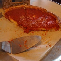 Photo taken at Frankie&amp;#39;s Chicago Style Pizza by Emily A. on 5/29/2011