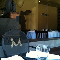 Photo taken at Mythos Bar &amp;amp; Restaurant by Wim M. on 8/14/2012