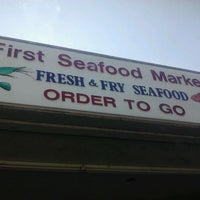 Photo taken at First Seafood Market by T R. on 1/4/2012