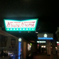 Photo taken at Krispy Kreme Doughnuts by candice e. on 11/2/2011