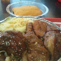 Photo taken at Golden Krust Caribbean Bakery and Grill by Al C. on 8/30/2012