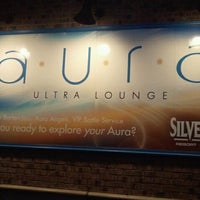 Photo taken at Aura Ultra Lounge by Regina B. on 1/13/2012