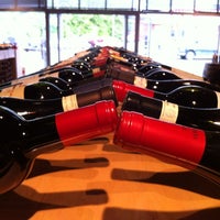 Photo taken at Woodland Wine Merchant by Bryan T. on 6/2/2012