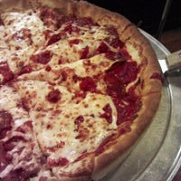 Photo taken at Knollas Pizza by Amber on 2/5/2012