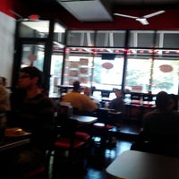 Photo taken at Muscle Maker Grill by Conrad H. on 12/28/2011