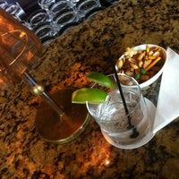 Photo taken at Fairmont Gold Lounge by purrsikat on 3/29/2012