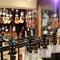 Photo taken at Dolphin Guitars by GOLD!E on 3/17/2012