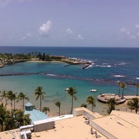 Photo taken at Condado Lagoon Villas at Caribe Hilton by Edwin E. on 8/2/2012