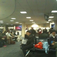 Photo taken at Gate 58A by Chikato Y. on 3/3/2012