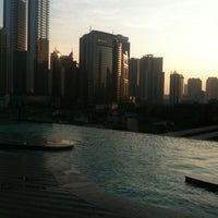 Photo taken at Infinity Swimming Pool by Zamzami A. on 8/26/2012