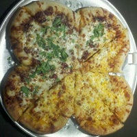 Foto tomada en The Original Graziano&amp;#39;s Pizza Restaurant  por Josselyn A. el 3/17/2012