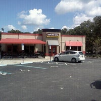 Photo taken at Genghis Grill by AJ t. on 9/5/2012