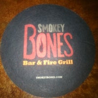 Photo taken at Smokey Bones Bar &amp;amp; Fire Grill by Derek W. on 5/16/2012