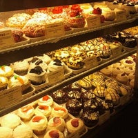 Photo taken at Crumbs Bake Shop by N O. on 2/8/2012