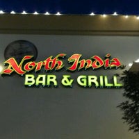 Photo taken at North India Bar &amp;amp; Grill by Lari N. on 5/22/2012