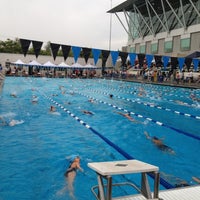 Photo taken at John C Argue Swim Stadium by Juyeon B. on 7/13/2012
