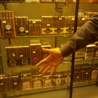 Photo taken at Around the World Cigars by Tony M. on 2/23/2012