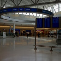 Photo taken at Gate 16 by Ilya V. on 3/9/2012