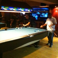 Photo taken at Afterhour Pool Club by Agung D. on 4/25/2012