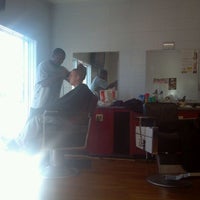 Photo taken at Kennys Barber Shop by Marcus H. on 10/17/2011