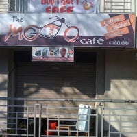 Photo taken at The Moto Cafe by Pavan M. on 2/6/2011