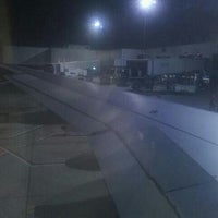 Photo taken at Gate 65 by Dillon T. on 10/19/2011