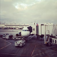Photo taken at Gate 8 by Arnold S. on 2/11/2012