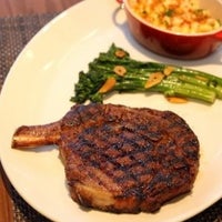 Photo taken at J. Gilbert&amp;#39;s Wood-Fired Steaks &amp;amp; Seafood St. Louis by Go! Magazine on 12/23/2011