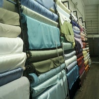 Photo taken at Textile Discount Outlet by Katie M. on 6/8/2012