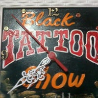 Photo taken at Estúdio Black Tattoo by Stephany B. on 4/28/2012